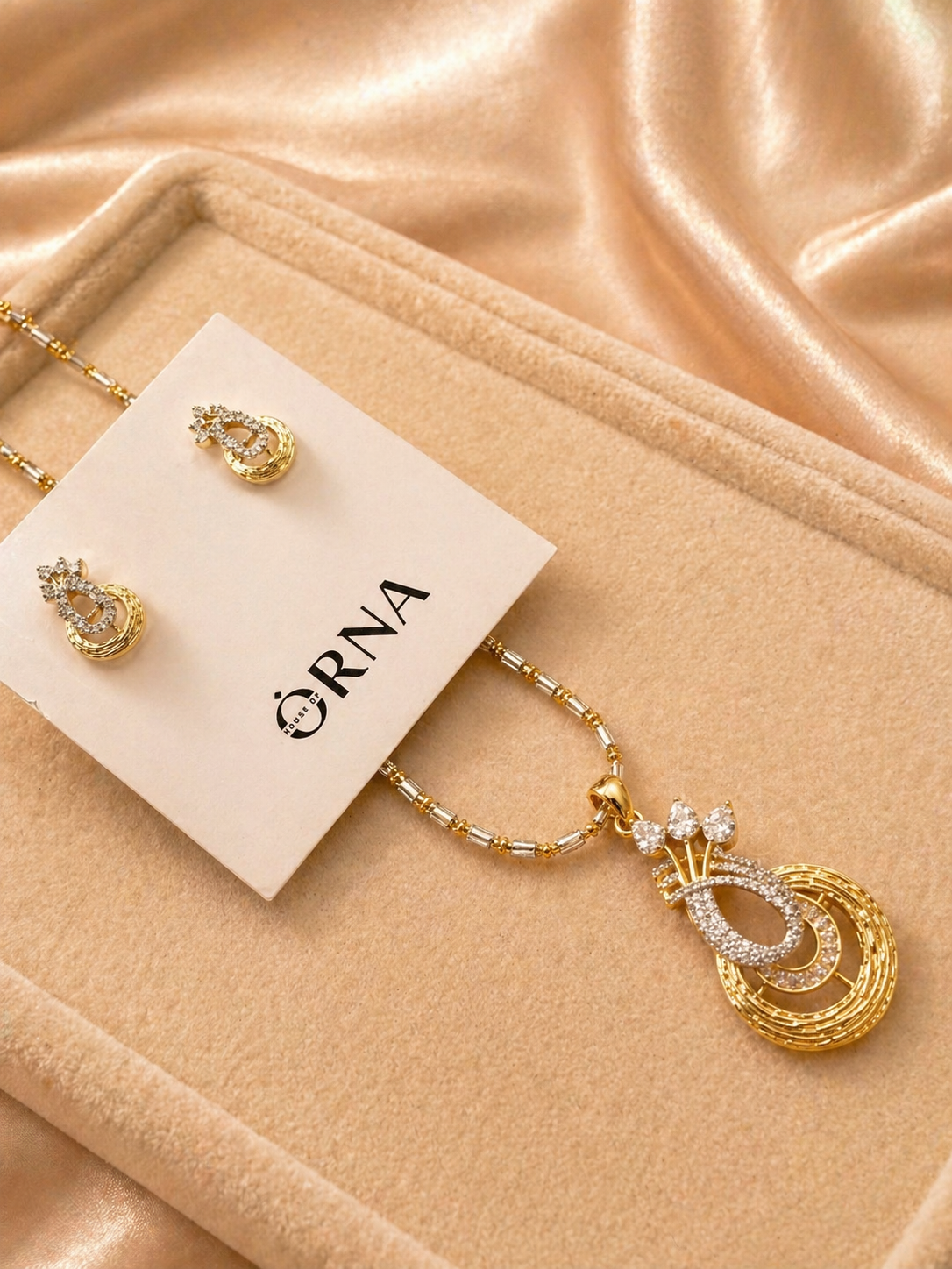 Gold Plated Oval Drop Pendant Necklace Set with Stone Detailing and Stud Earrings