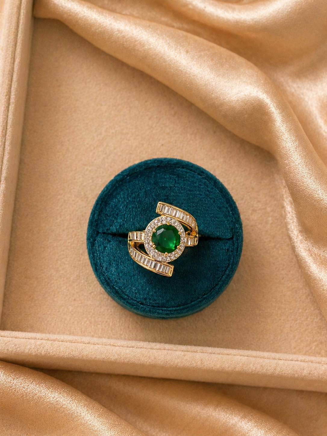 Adjustable emerald green statement ring with diamond look halo and baguette bands for cocktail and festive wear