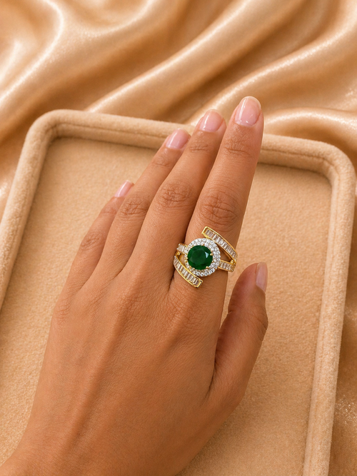 Adjustable emerald green statement ring with diamond look halo and baguette bands for cocktail and festive wear