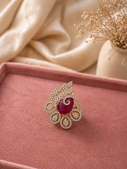 Adjustable ruby red floral statement ring with leaf motif and diamond look detailing