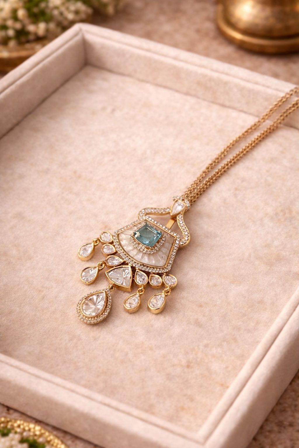 Real diamond polki look pendant set with sage green stone and crystal drops for festive and wedding wear