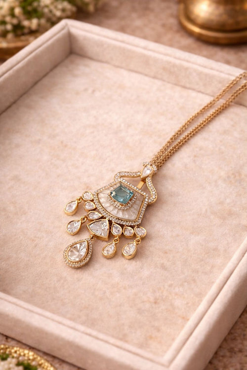 Real diamond polki look pendant set with sage green stone and crystal drops for festive and wedding wear