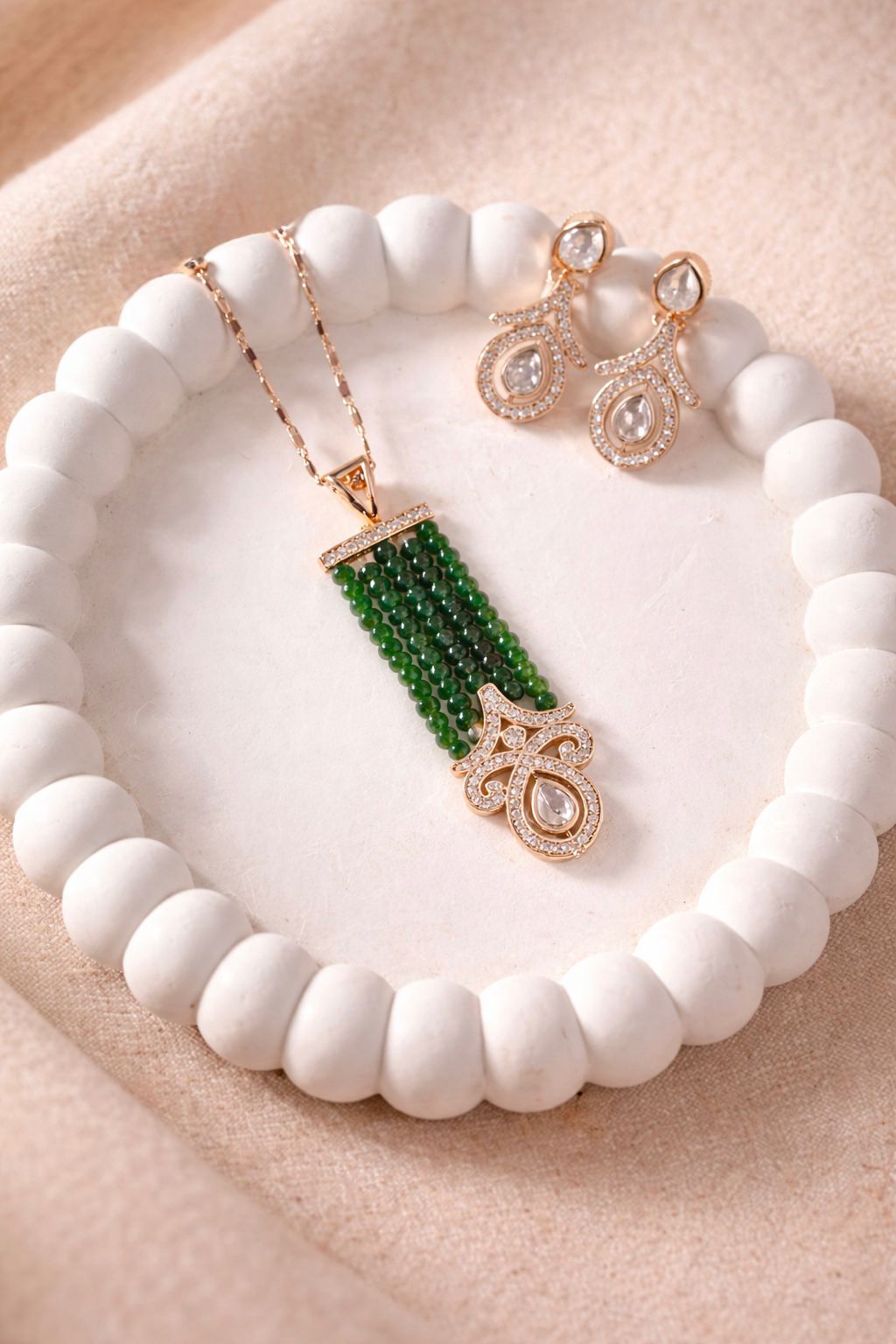 Real diamond look pendant set with emerald green bead tassels for festive and evening wear