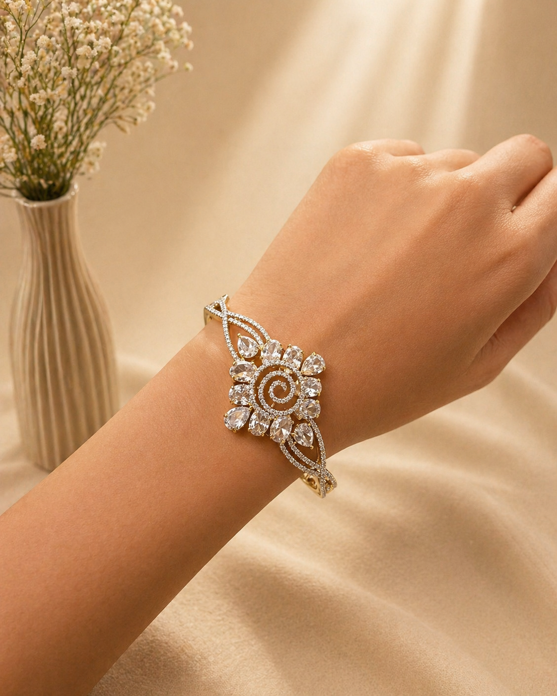 Floral statement bracelet with crystal design worn on hand for festive and elegant wear
