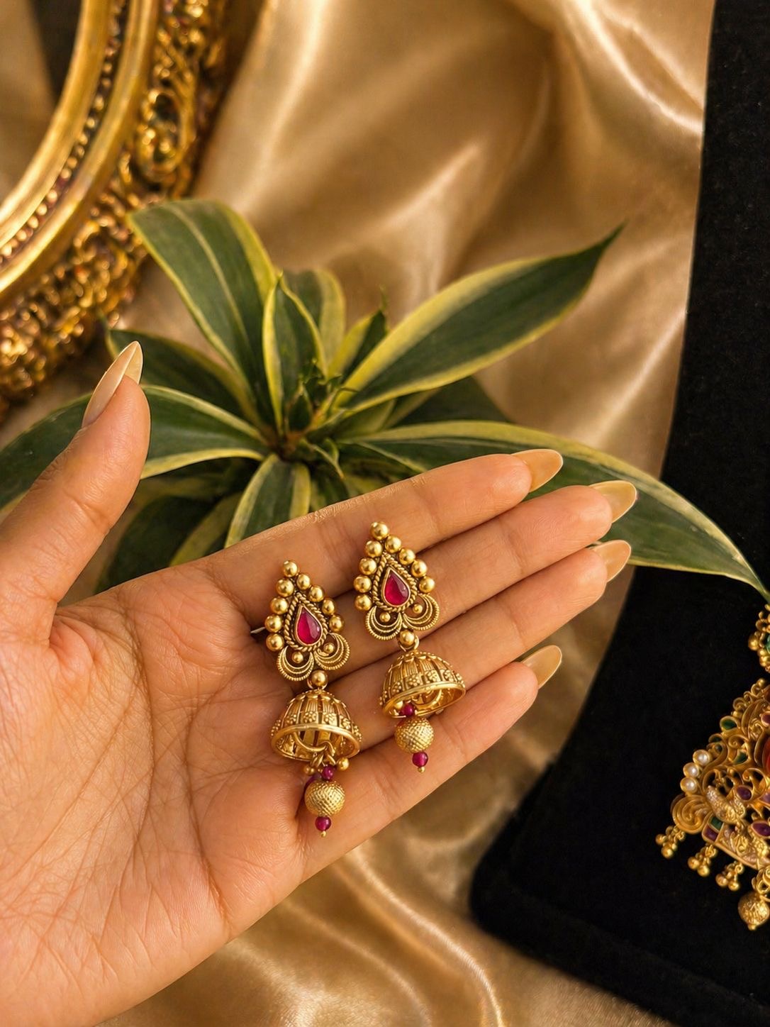 ganesha temple jewellery long necklace with pearl strands and matching jhumka earrings