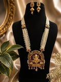 ganesha temple jewellery long necklace with pearl strands and matching jhumka earrings