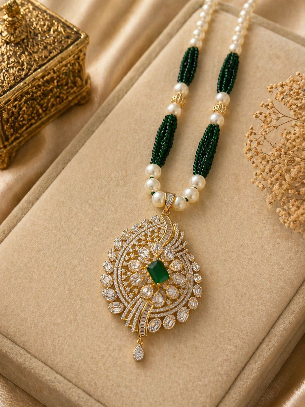green stone gold plated pendant necklace set with pearl beads and matching earrings