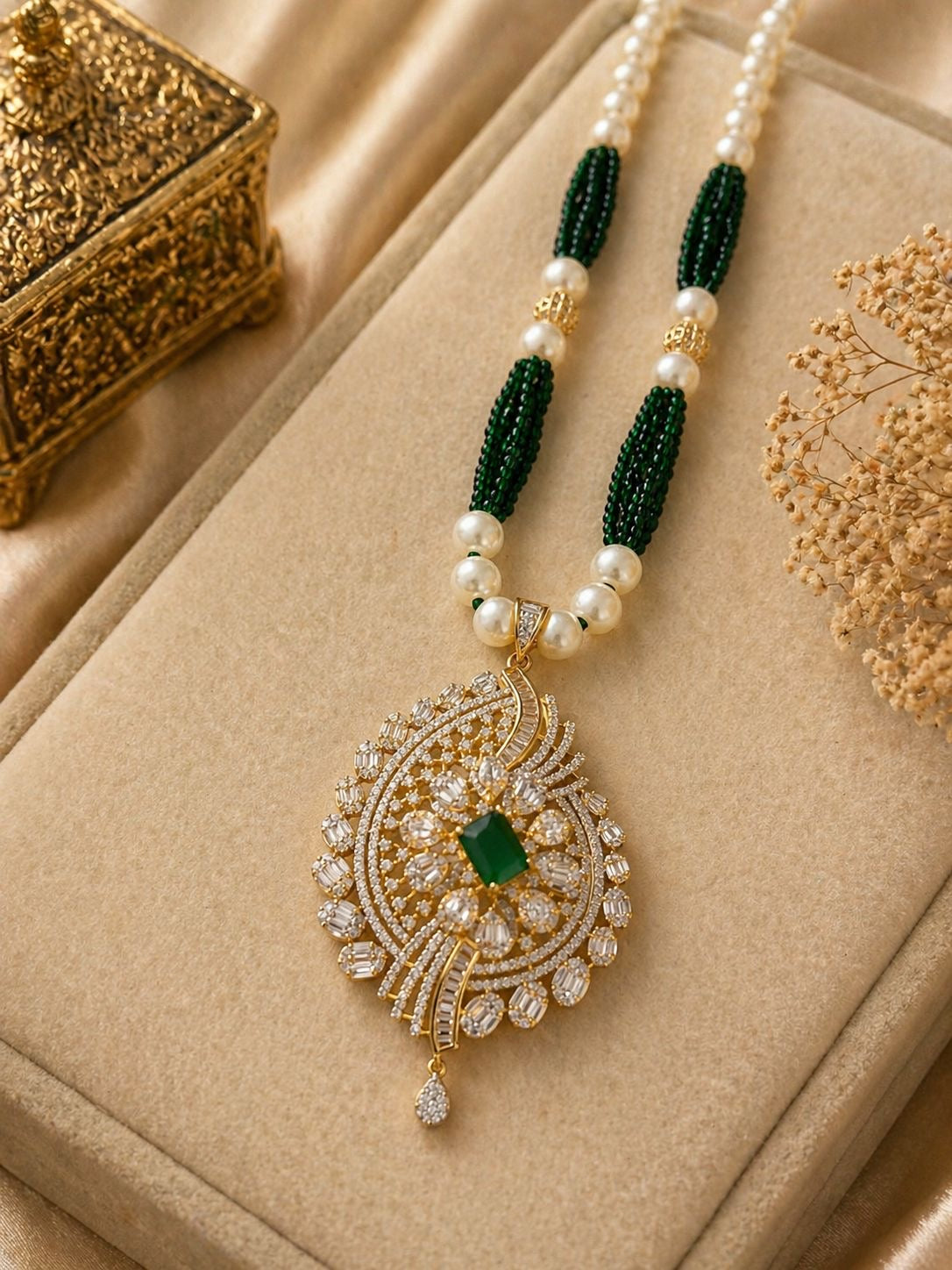 green stone gold plated pendant necklace set with pearl beads and matching earrings