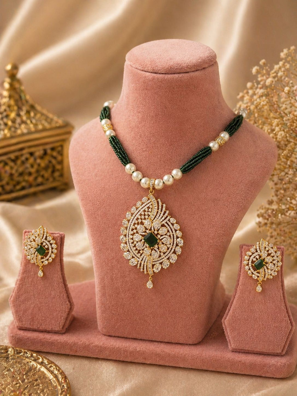 green stone gold plated pendant necklace set with pearl beads and matching earrings