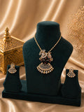 gold plated krishna motif pendant necklace set with cz stones and matching earrings