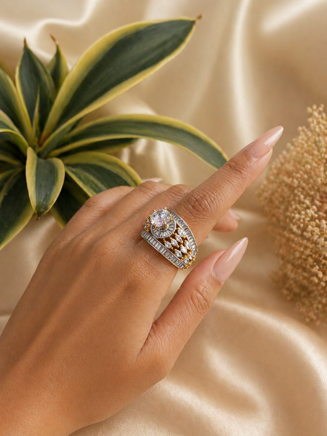 multi layer zircon statement ring with round solitaire accent gold finish worn on hand