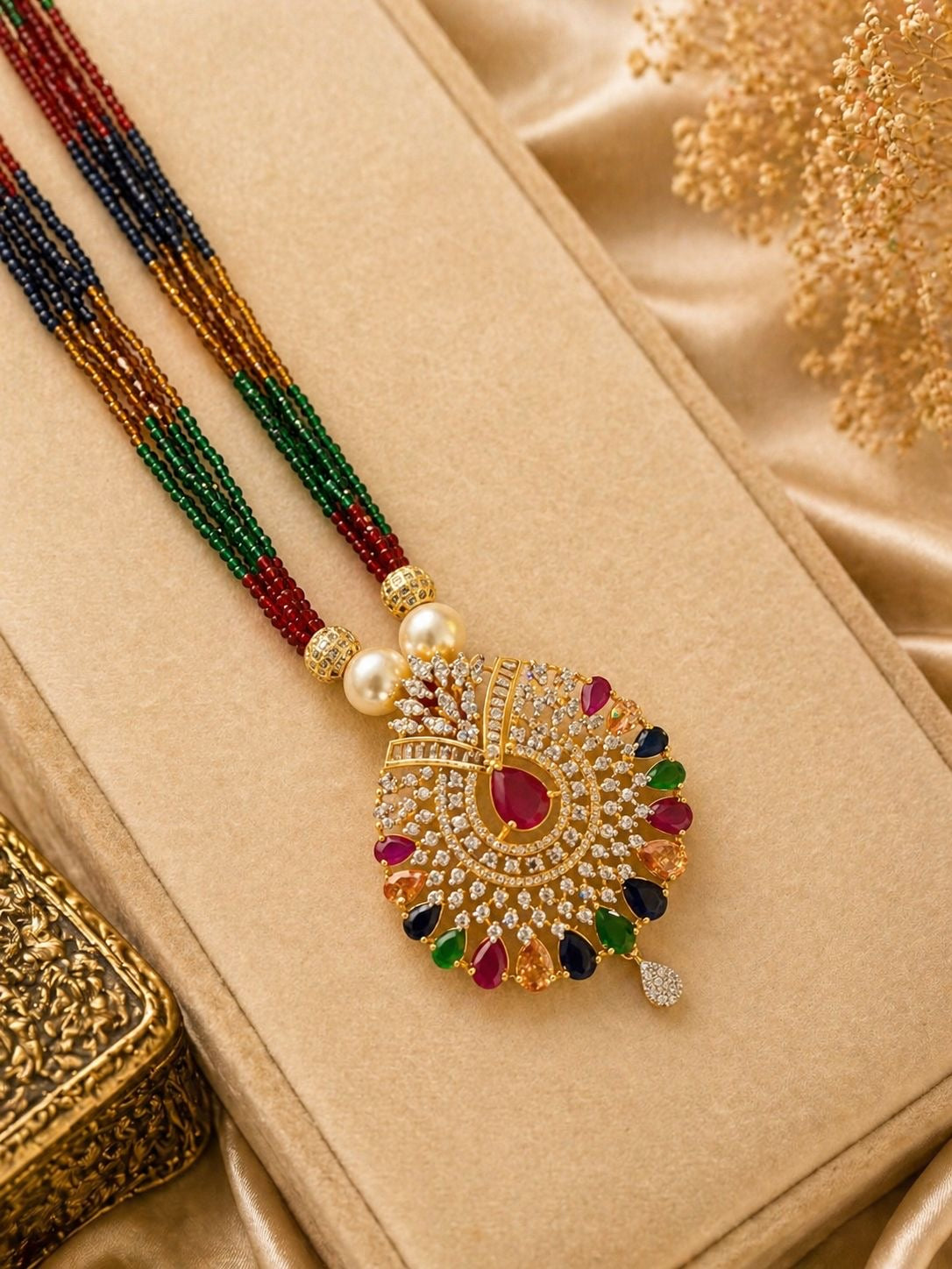 multicolor stone gold plated pendant necklace with beaded strings and matching earrings