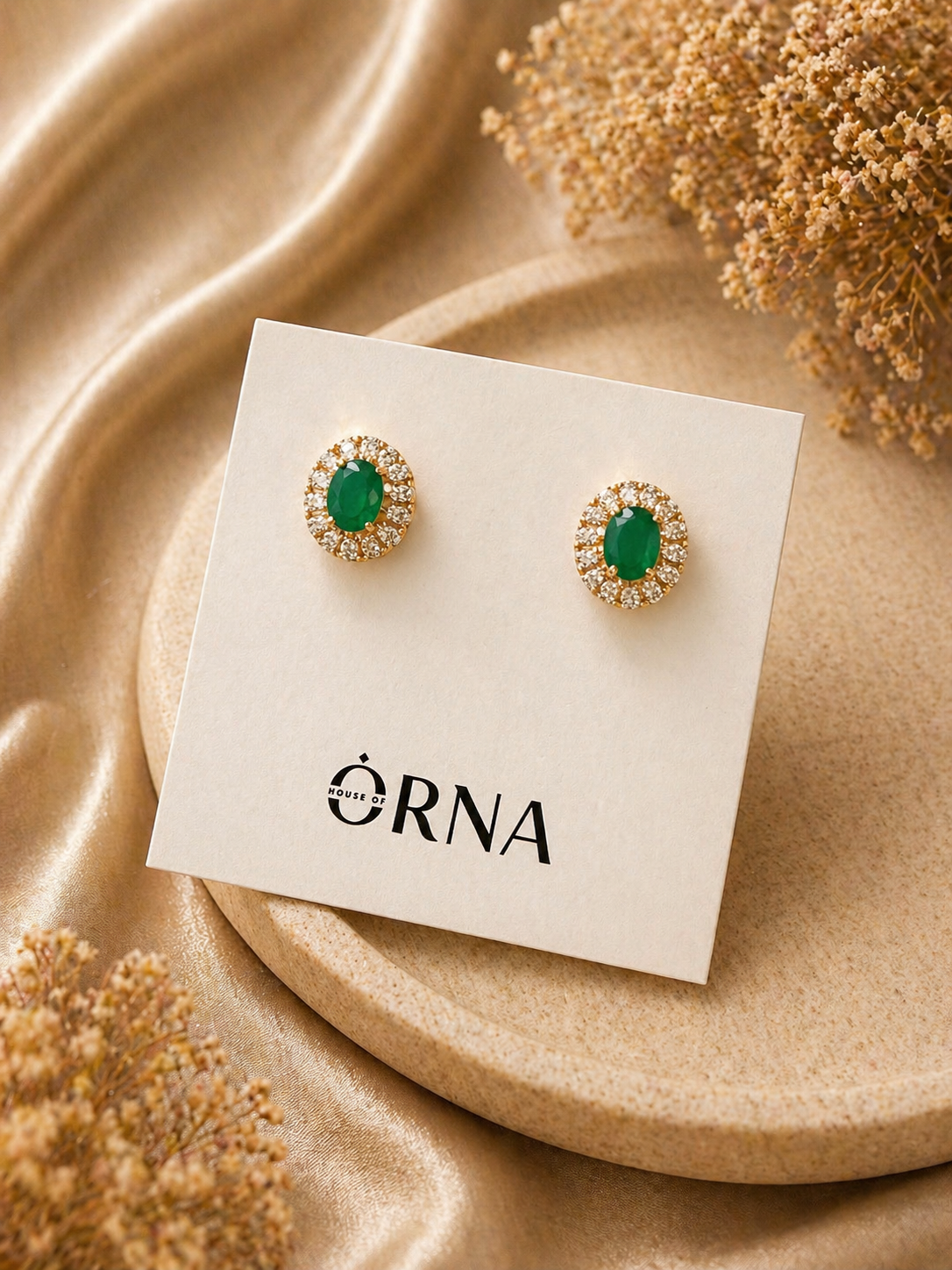 oval green stone stud earrings with crystal halo in gold finish