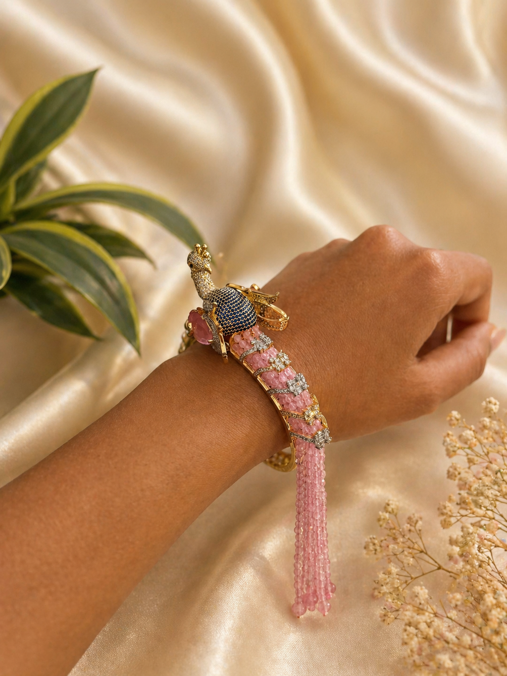 peacock design kada bracelet with pink bead tassels and intricate detailing