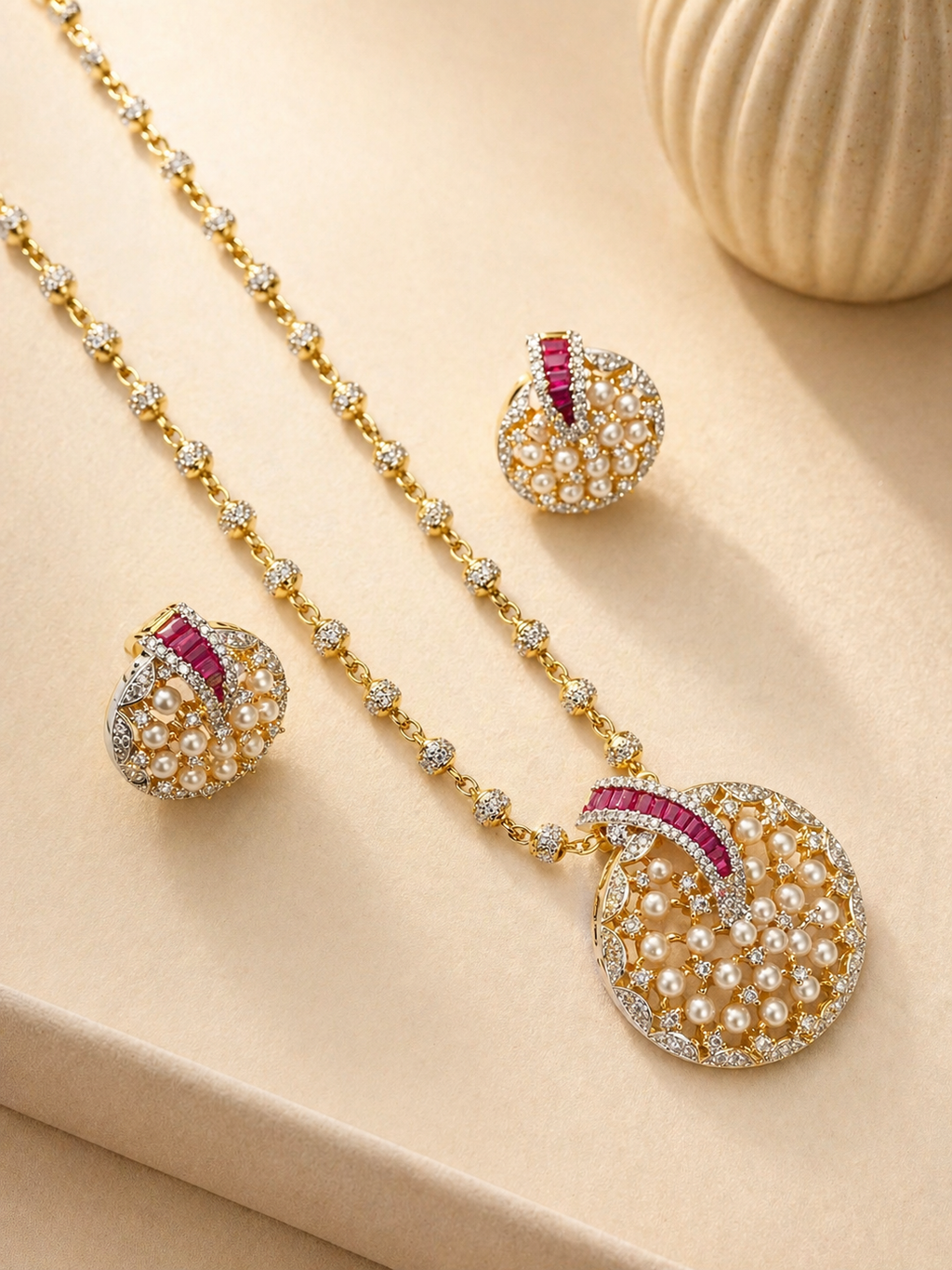 Pearl pendant set with ruby stone accent and crystal detailing for festive and elegant wear