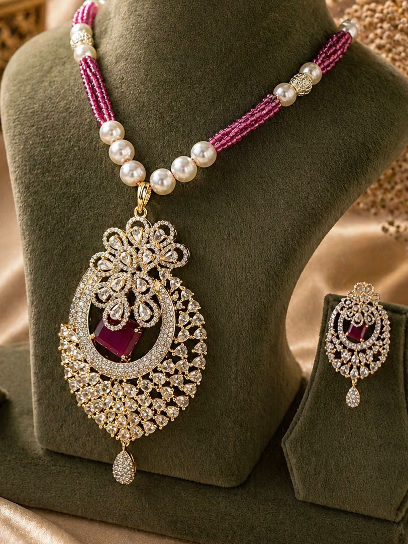 ruby pink beaded kundan pendant necklace set with matching earrings and pearl detailing