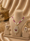 ruby pink beaded kundan pendant necklace set with matching earrings and pearl detailing