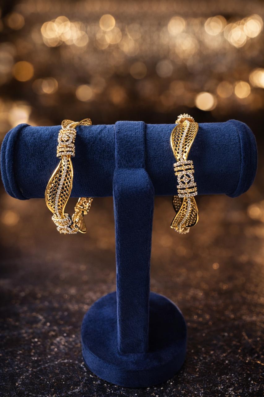 Real gold finish diamond look bangles set with intricate design for wedding and festive wear