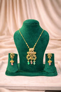 Real gold finish temple necklace set with intricate design and pastel stone drops for wedding and festive wear